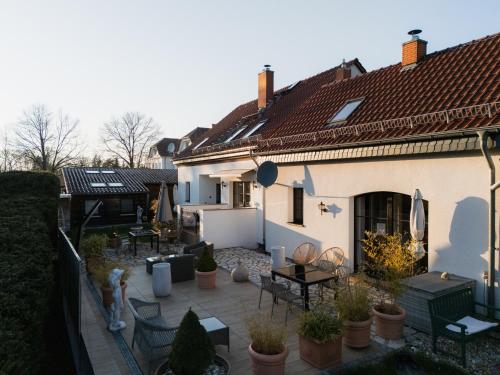 a view of a house with a patio at Ferienhof am Trift in Bad Saarow