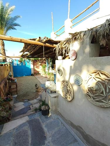 a stone wall with some plants on it at Motel moon in Tunis
