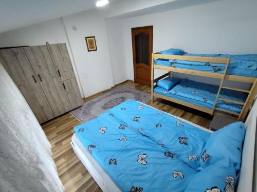 Postel nebo postele na pokoji v ubytování White Apartment