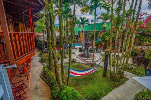 an aerial view of a playground with palm trees at Poshtel Arenal in Fortuna
