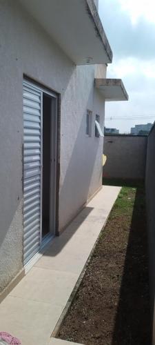 a door on the side of a building at Casa suite airport in Campinas