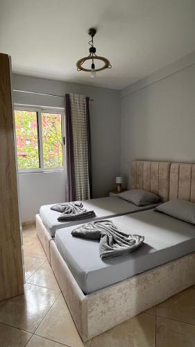 Llit o llits en una habitació de Comfyhome