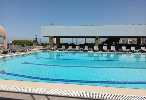 Bazén v ubytování Duplex in Siwar with pool 2min from Le Royal Hotel nebo v jeho okolí
