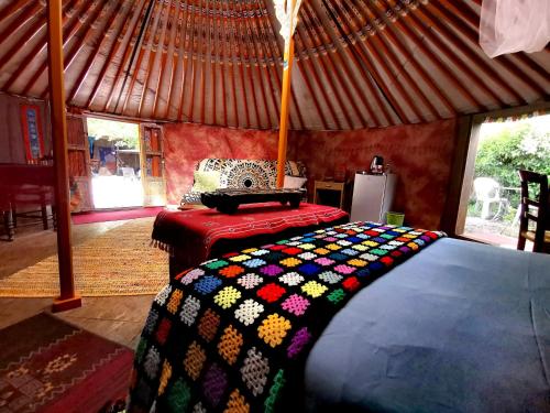 Postel nebo postele na pokoji v ubytování Yourte Namaste Homestay