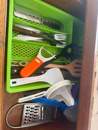 a drawer filled with lots of different types of scissors at Departamento Sencillo Foro Sol GNP y Aeropuerto in Mexico City