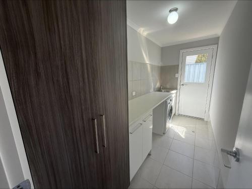 Η κουζίνα ή μικρή κουζίνα στο Bayview Escape
