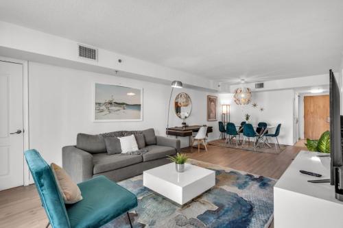 a living room with a couch and a table at Enjoy Brickell Living 2 BR Retreat With Free Parking in Miami