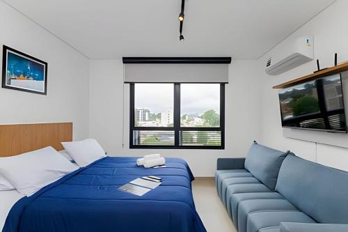 Postel nebo postele na pokoji v ubytování Apartamentos modernos próximo ao Jardim Botanico e à Rodoviária