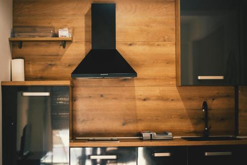 Η κουζίνα ή μικρή κουζίνα στο Rina Rental