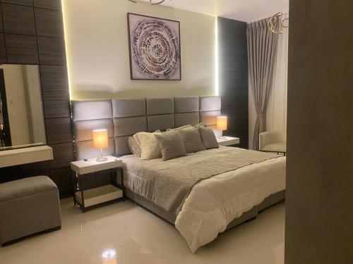 Llit o llits en una habitació de Boulevard luxury Studio