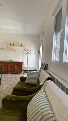 Postel nebo postele na pokoji v ubytování Apartment Caorso Rino