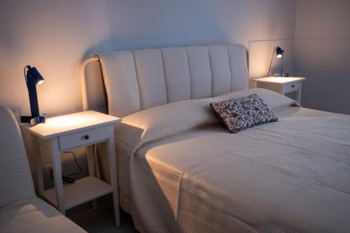 Postel nebo postele na pokoji v ubytování Casa Nicuzza