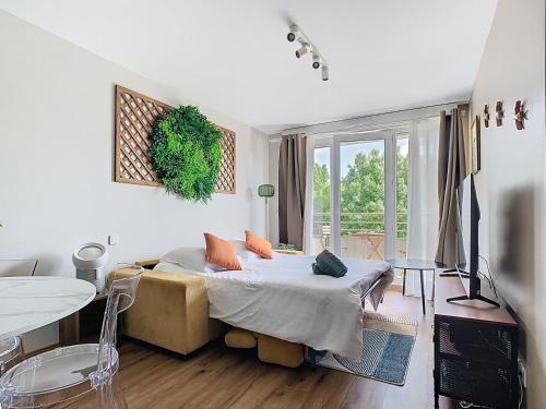 Postel nebo postele na pokoji v ubytování Le Bucolique