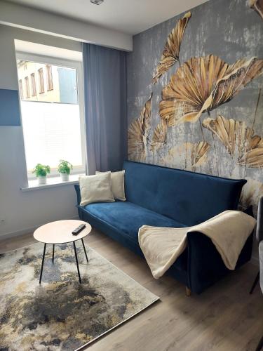 Posezení v ubytování Noclegi Duet House Green Harmony Studio wejście na kod CENTRUM Ptak, Orientarium, Mandoria, Fala, Centrum Zdrowia Matki Polki, bezpłatny parking, klimatyzacja
