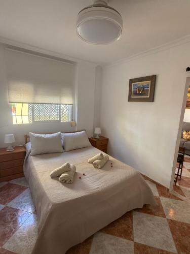 Ένα ή περισσότερα κρεβάτια σε δωμάτιο στο Rosan 1