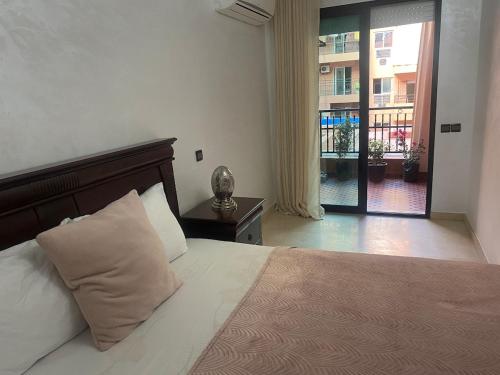 Ein Bett oder Betten in einem Zimmer der Unterkunft Appartement en plein centre