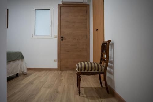 Postel nebo postele na pokoji v ubytování Casa dos Móveis
