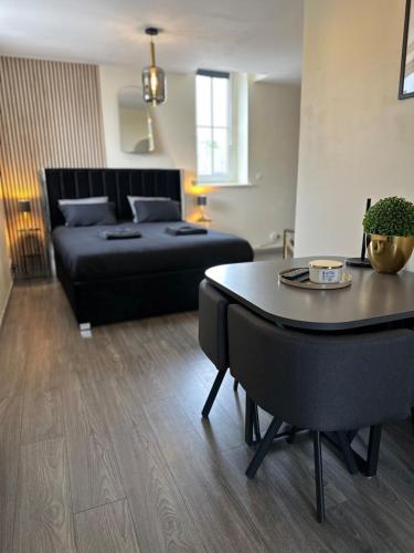 Ένα ή περισσότερα κρεβάτια σε δωμάτιο στο Appart Duplex Proche Centre