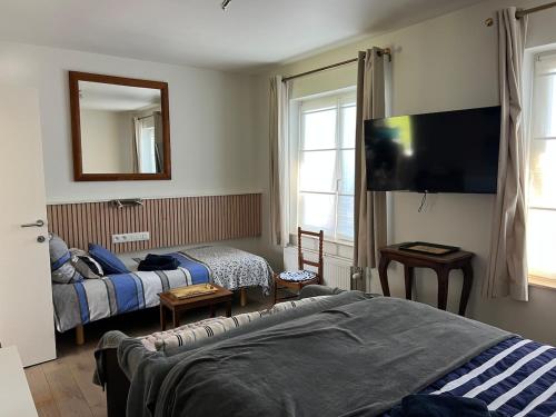 Postel nebo postele na pokoji v ubytování Céline Apartment
