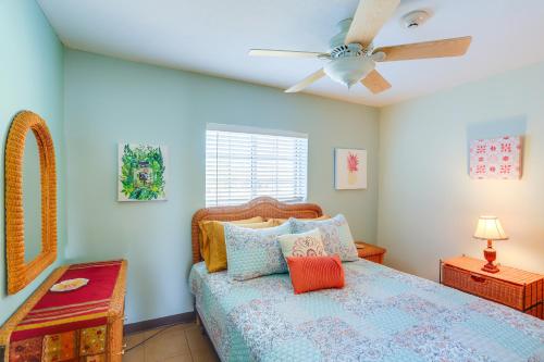 a bedroom with a bed and a ceiling fan at Waterfront Bass Island Retreat with Balcony and TV in Put-in-Bay