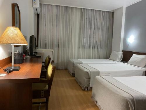 Postel nebo postele na pokoji v ubytování City Hotel by Fast10