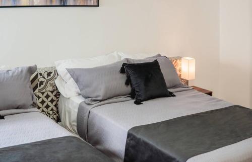 Postel nebo postele na pokoji v ubytování Hotel Atilana