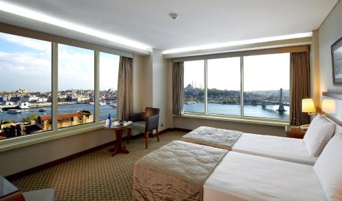 Ένα ή περισσότερα κρεβάτια σε δωμάτιο στο Istanbul Golden City Hotel