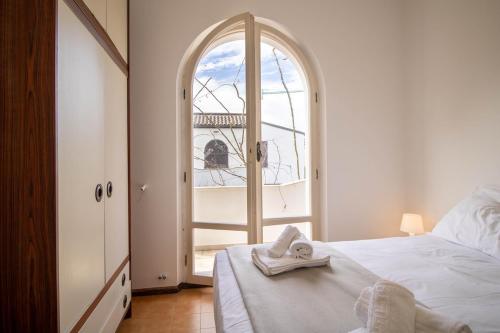 Ένα ή περισσότερα κρεβάτια σε δωμάτιο στο JACUZZl 13 posti letto Wifi AC Parking Beach