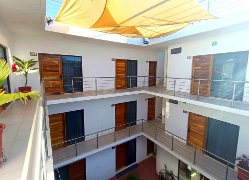 an overhead view of a building with an umbrella at Punta Colibrí in Brisas de Zicatela