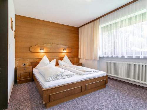 Ένα ή περισσότερα κρεβάτια σε δωμάτιο στο Haus Daniela