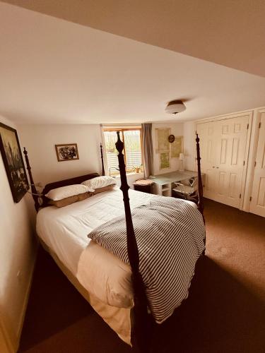 a bedroom with a large bed in a room at Southeast Portland Parkside Gem on Mount Tabor in Portland