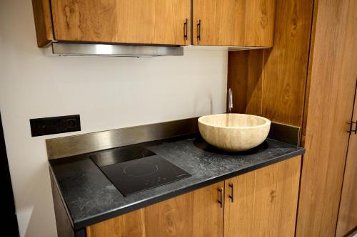 Dapur atau dapur kecil di Alma Apart Residence