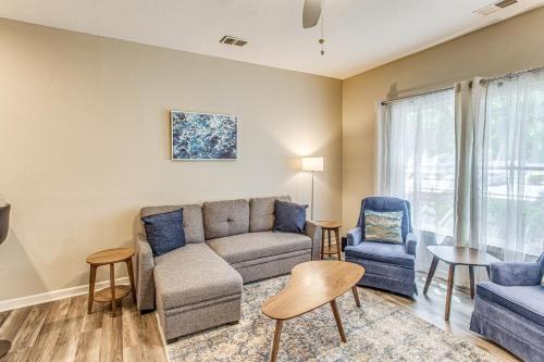 a living room with a couch and two chairs at Golf Villa Near Sunset Beach and Intracoastal! in Sunset Beach