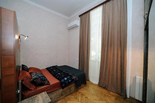 Postel nebo postele na pokoji v ubytování Apartment Alexandra