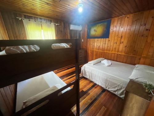 Postel nebo postele na pokoji v ubytování Chácara do Riacho