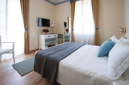 Katil atau katil-katil dalam bilik di Hotel Villa Erica