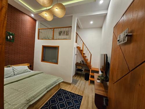 Ένα ή περισσότερα κρεβάτια σε δωμάτιο στο Arum Bromo Villas