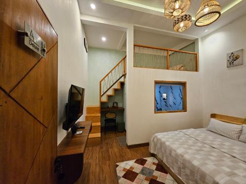 Ένα ή περισσότερα κρεβάτια σε δωμάτιο στο Arum Bromo Villas