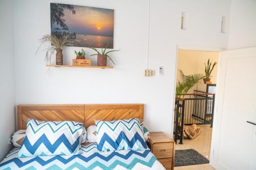 Postel nebo postele na pokoji v ubytování Indonesia Eco Tour Homestay