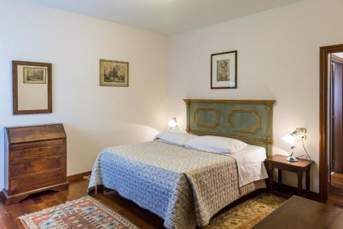 Säng eller sängar i ett rum på Agriturismo Le Anfore