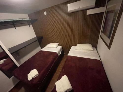 Una cama o camas en una habitación de Suites Apodaca