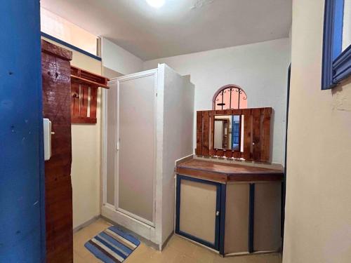 a bathroom with a vanity with a mirror on it at A mini apartment in Cuernavaca, in a good location in Cuernavaca