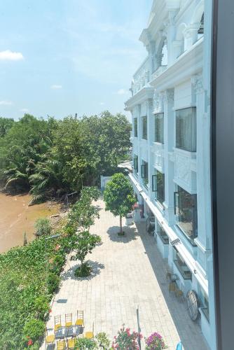 a view from a window of a building at Bamboo Riverside Boutique Hotel in Ben Tre