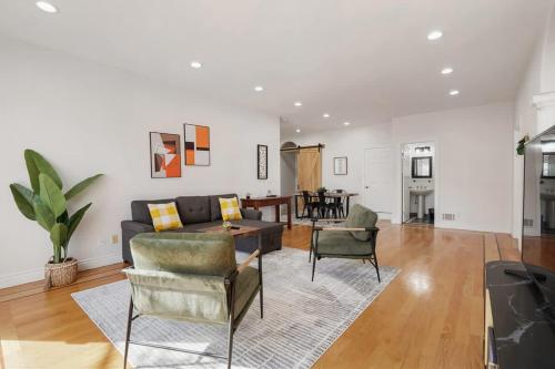 a living room with a couch and chairs and a table at Spacious 3BR, One and a half Bath 2nd Floor in San Francisco in San Francisco
