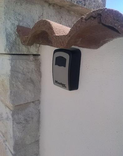 a black and white object on the side of a wall at Les Belous in La Rochelle
