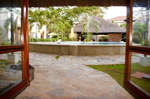 Ein Garten an der Unterkunft Acacia Tree Garden Hotel