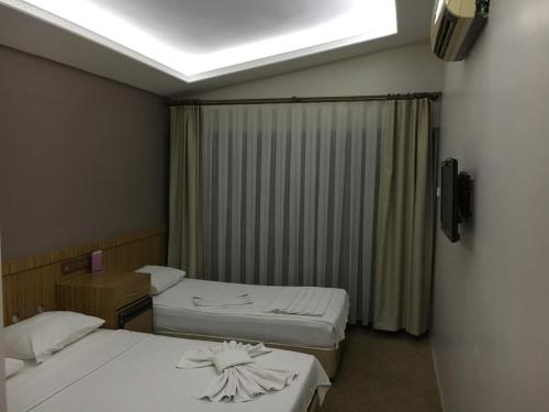Lara Kapris Hotelにあるベッド