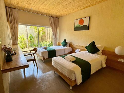 Postel nebo postele na pokoji v ubytování Vả Riverside Retreat