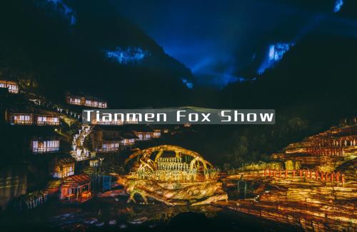 a sign that says tarzan fox show at night at Breeze Alley Inn--English reception-Tourism planing-Ticket reservation in Zhangjiajie