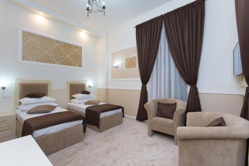 Кровать или кровати в номере La Strada Boutique Villa